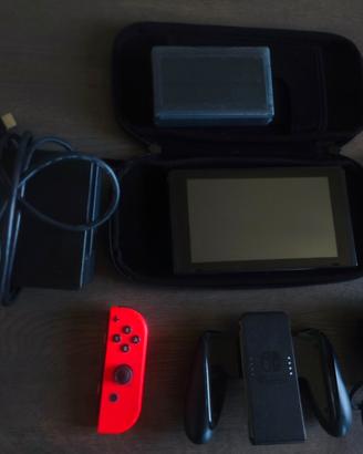 Nintendo Switch + Joy-Con Rosso e altro
