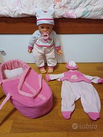 Bambola "Bimbo" con culla portatile