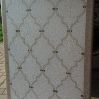 Tavolo in terrazzo e intarsi di mosaico