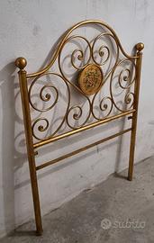 Testata in ferro battuto