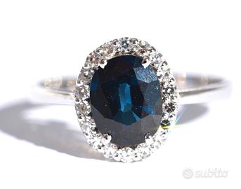 Anello Oro 18kt con 18 diamanti bianchi e Zaffiro