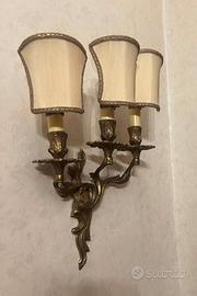 coppia di lampade a tre bracci