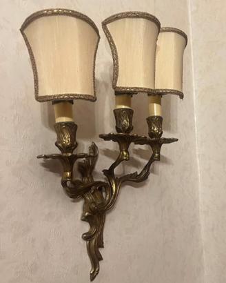 coppia di lampade a tre bracci