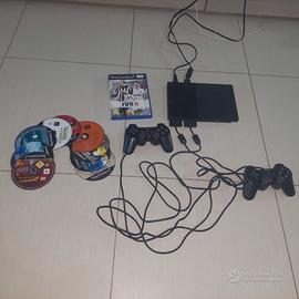 Ps2 con 2 joistik e giochi