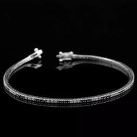 BRACCIALE TENNIS ORO 18KT BRILLANTI NERI E BIANCHI
