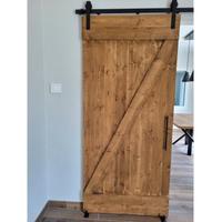 Porta scorrevole in legno massello