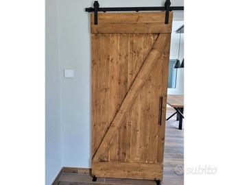 Porta scorrevole in legno massello