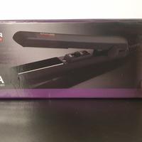 piastra capelli da viaggio nuova