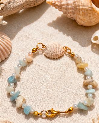 Bracciale mare con conchiglia e pietre dure. 