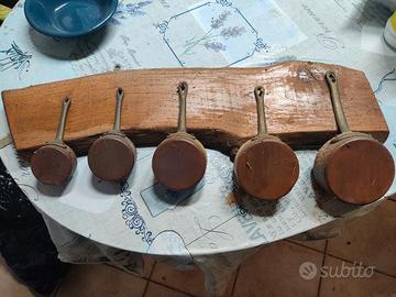 pentolini in rame con espositore