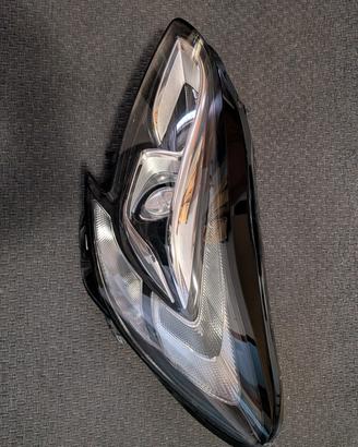 Faro sinistro Bi-Xeno Opel Corsa 2014 HELLA