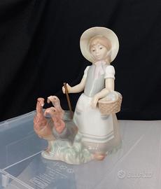 Porc. Lladro "Ragazza con tacchini" cm 21