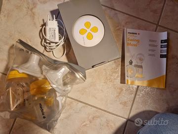 Tiralatte portatile  doppio Medela swing maxi