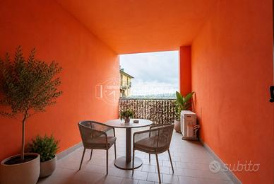 BILOCALE CON TERRAZZO E GARAGE
