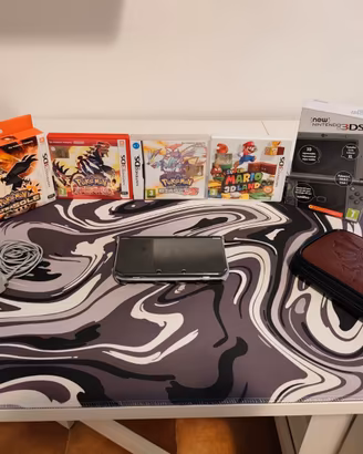 New Nintendo 3DS XL Nero + Giochi Pokemon e Mario