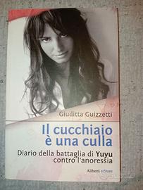 Il cucchiaio è una culla - Giuditta Guizzetti