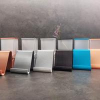 Supporto smartphone da tavolo con cassetto e vaso