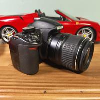 nikon d3100 + obiettivo 