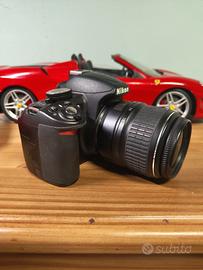 nikon d3100 + obiettivo 