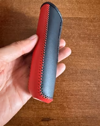 Coprifreno a mano bicolor rosso e nero modello uni