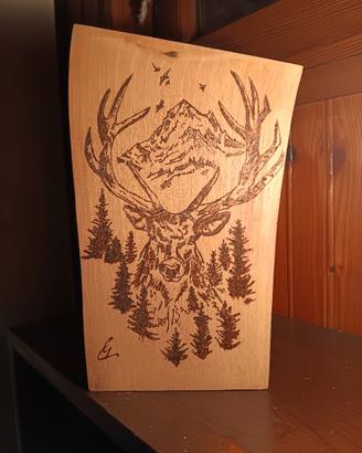 Disegni pirografati su legno 