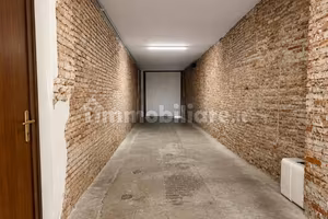 Garage 97mq+immobile comm. vicenza centro storico
