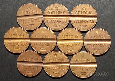 Lotto 12 gettoni telefonici marchi e anni diversi