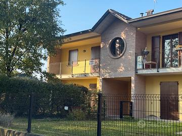 Appartamento con giardino, doppia terrazza e box