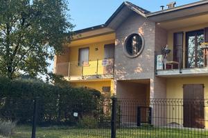 Appartamento con giardino, doppia terrazza e box