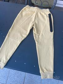 pantalone tech nike giallo