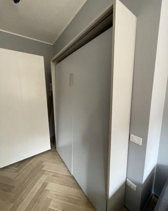Letto matrimoniale a scomparsa verticale
