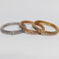 3 Bracciali oro 18 kt di complessivi gr. 113.80