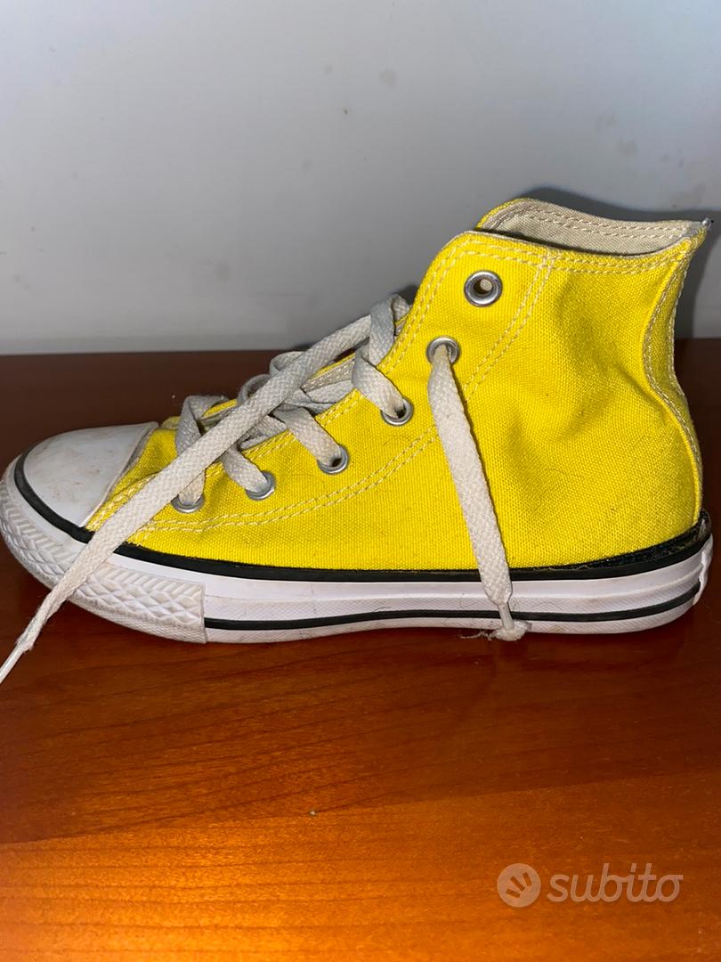 Converse gialle con outlet borchie