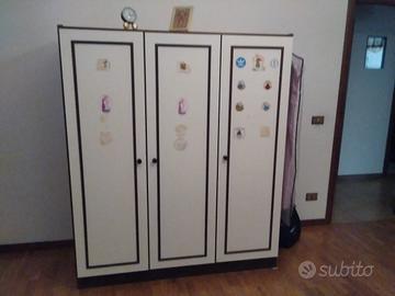 armadio tre ante camera