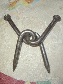 Rompicapo di metallo chiodi intrecciati inizi '900