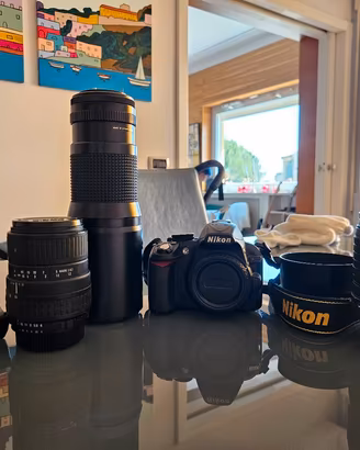 Nikon D3100 + 18-105 VR + Tokina 400mm + Sigma 70-