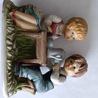 statuina bambini in ceramica 