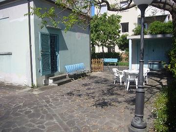 Trilocale con Giardino Privato e Posto Auto