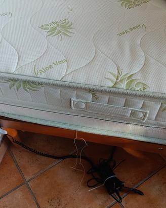 rete retrattile  e materasso ortopedico 