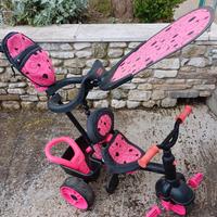 triciclo rosa  e nero per bambine