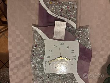 Orologio da parete e svuota tasche