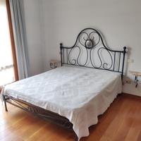 Letto con testiera in ferro battuto fine '800