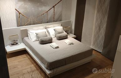 Letto matrimoniale moderno bianco con contenitore 