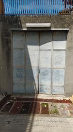 Portone a battente in ferro per garage