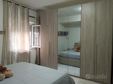 Camera matrimoniale con letto contenitore 