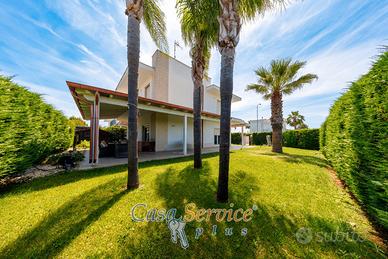 Villa con giardino