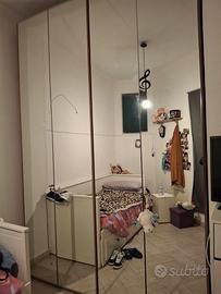 armadio con 4 ante a specchio