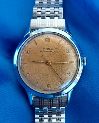 Doxa 1954 manuale quadrante terra arsa