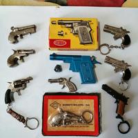 9 pistole vintage giocattolo in miniatura