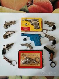9 pistole vintage giocattolo in miniatura